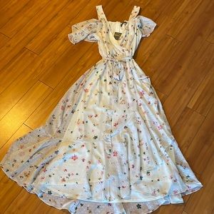 NWT- Melonie size 16 style #92030MT. White floral ruffled belted maxi dress.